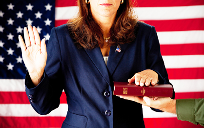 Politician: Woman Taking an Oath on the Bible