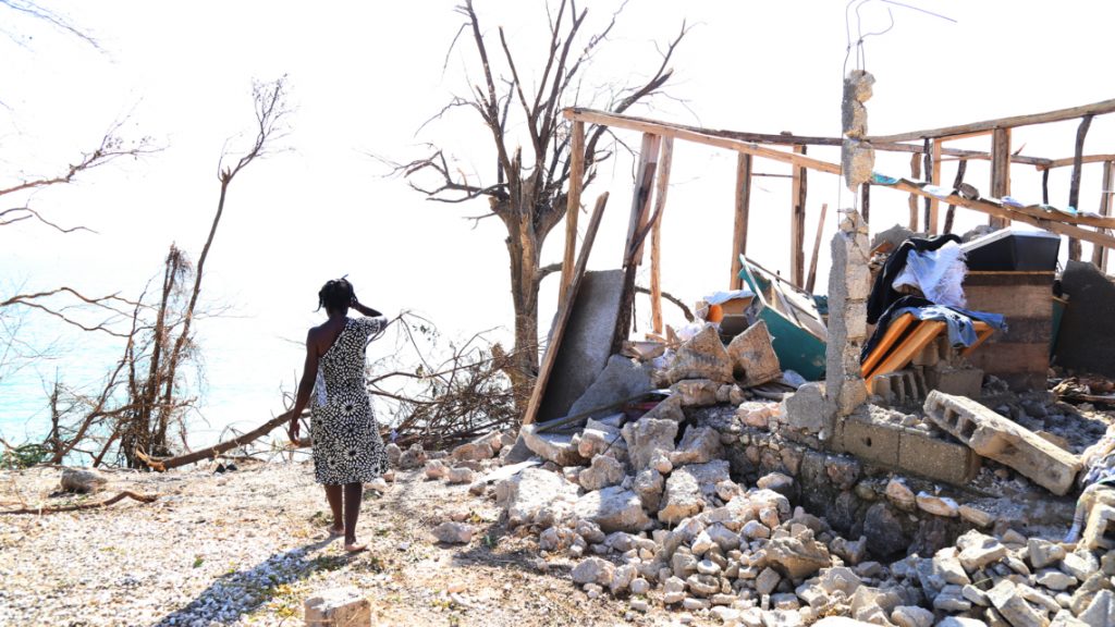 Mikai Edward 42, lost her home where she lives with her six children and husband in front of the ocean in the Zoranje neighborhood of Roche Bateau.